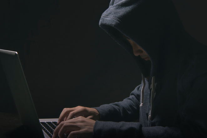 A photo of a person committing property fraud